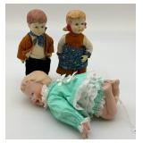 Three Porcelain Dolls