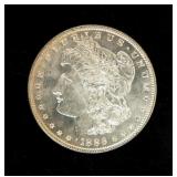 Coin 1886 Morgan Silver Dollar in Gem BU