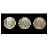 Coin (3) Peace Silver Dollars AU to Almost Unc.