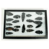 20 Obsidian Arrowheads in Display
