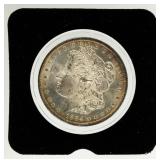 Coin 1884-O Morgan Silver Dollar in Brilliant Unc.