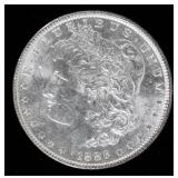 Coin 1886 Morgan Silver Dollar in Brilliant Unc.