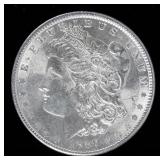 Coin 1887 Morgan Silver Dollar in Brilliant Unc.