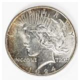 Coin 1924  Peace Silver Dollar in Brilliant Unc.