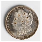 Coin 1887  Morgan Silver Dollar Brilliant Unc.