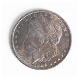Coin 1886 Morgan Silver Dollar in Gem AU
