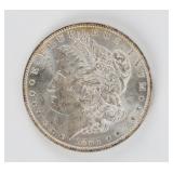 Coin 1884-O Morgan Silver Dollar in Brilliant Unc.