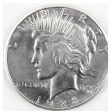 Coin 1928-P Peace Silver Dollar in Almost Unc.