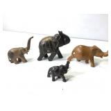 4 Carved Elephant Figurines
