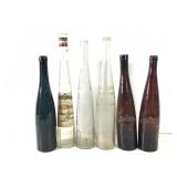 Liquor - 6 Elongated Bottles Wine, Brandy, Milano