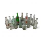 13 Printed & Embossed Vtg Soda Bottles