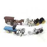 4 Cast Iron Horse Drawn Wagons