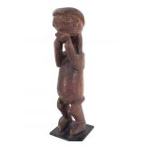 Wood Carved Figure With Hands Clasped Over Mouth