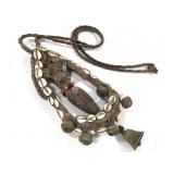 Female Figure Amulet With Cowrie Shell And Bells