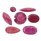 7 Loose Faceted Rubys 1.97 Grams TW