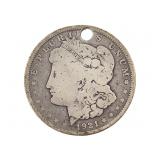 1921 Morgan Dollar, worn and holed
