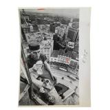 AP Wire Photo Worker Atop Solder & Sailor Mon 1964