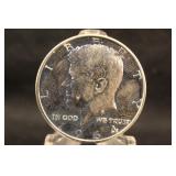1964 silver Kennedy Half Dollar