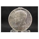 1964 silver Kennedy Half Dollar