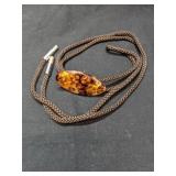 Vintage Bolo Tie Featuring Floral Amber-colored