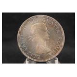 1964 UNC Canada Toned Silver Dollar