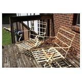 PAIR OF WROUGHT IRON CHAIRS - 1 IS A ROCKER