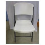 Nice folding white chair by Life Time; pick up