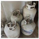 4 LP Tanks-3 Full Lg one is Empty
