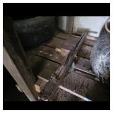 Vintage Wooden Tool with Metal Parts and Tires