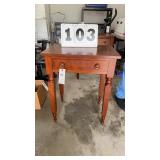 cherry wood or stained cherry table with drawer