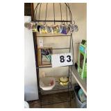 Metal rack and contents. Rack is 24' wide and 6'