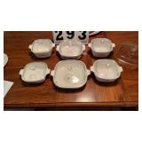 6 CorningWare bowls with lids.