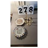 5 candle holders and 2 wall hanging plates