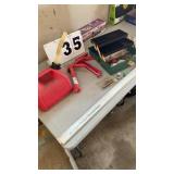 2 caulk guns, 1.5 gallon gas can, tackle box with