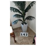 21 inch tall flower pot with plant (not real).