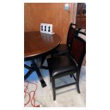 Wood table 48' wide x 36' tall and 4 chairs