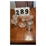 Appears to be 2 pressed glass compote or candy
