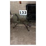 Glass top coffee table 50' long x 26' wide