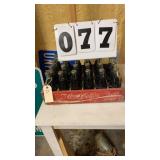Coca-Cola case with 24 coke bottles names of