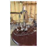 Rustic, lattice-wire basket chandelier features