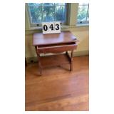 vintage wooden side table features a single