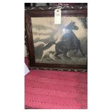 framed artwork appears to be an antique