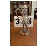 appears to be a vintage silver-plated and clear