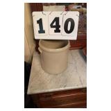 Crock 11 inches tall x 10 inch wide. Crack shown