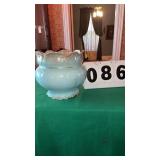 an antique porcelain jardiniere or planter,
