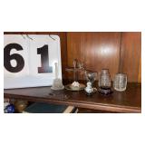 7 small glass items.