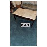 antique coffee table features an elegantly