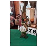 appears to show an antique hand-painted porcelain