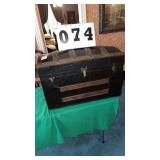 antique dome-top travel trunk, commonly known as