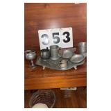 7 pewter items and silver tray.